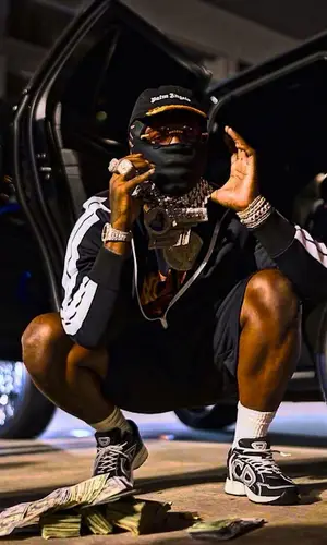 EST Gee wearing Palm Angels cap