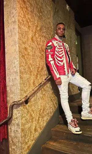 Lil Keed wearing Hudson jacket