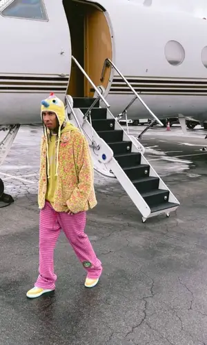 Tyga wearing 99%IS shirt