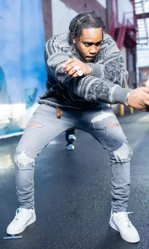 Fivio Foreign wearing Balenciaga sweater