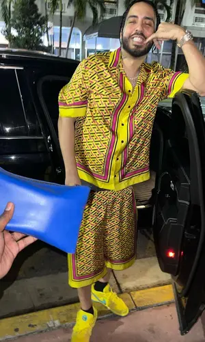 French Montana wearing Versace shirt