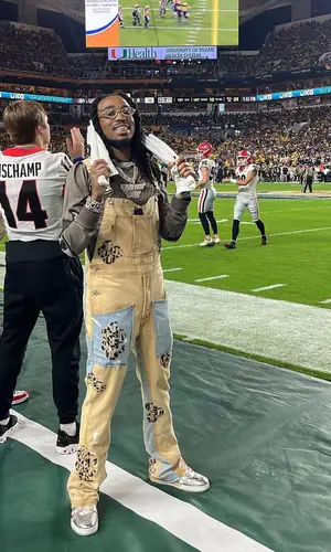 Quavo wearing Givenchy sweater
