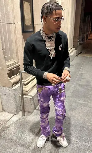 Lil Migo wearing Off-White sweatshirt