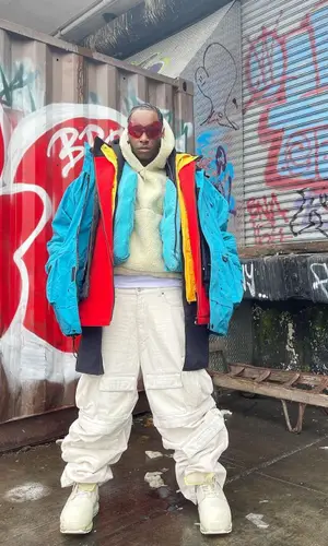 Bloody Osiris wearing Entire Studios hoody