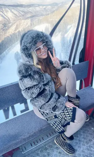 Latto wearing Dior sweater