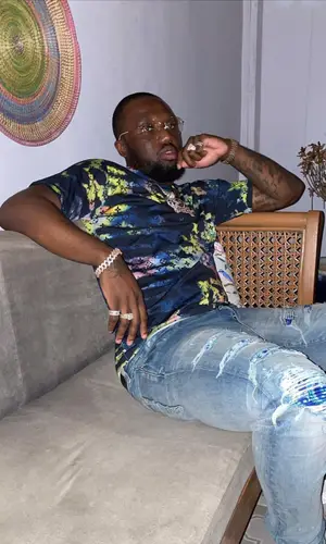 Headie One wearing Louis Vuitton shirt