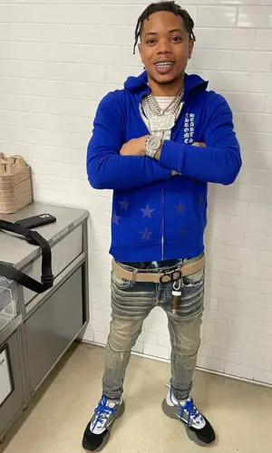 Lil Migo wearing Dior sneakers