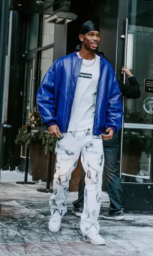 Shai wearing Supreme t-shirt