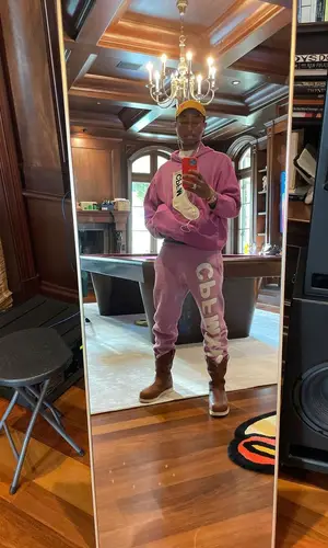 Pharrell Williams wearing Cactus Plant Flea Market hoody
