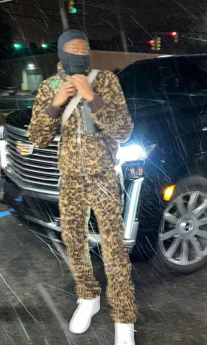 Meek Mill’s Outfit in Amiri Jacket & Nike Sneakers (2022)