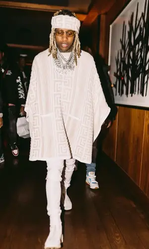 Lil Durk wearing Raf Simons boots
