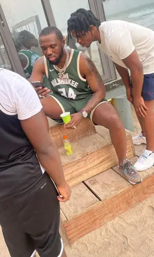Headie One wearing Nike shorts