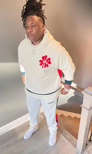 Tay Keith wearing Palm Angels pants