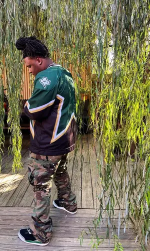 Tay Keith wearing Gallery Dept. pants