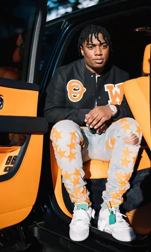 Fredo Bang wearing Amiri jeans