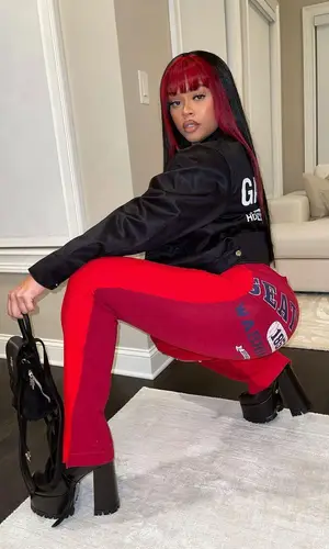 Latto wearing Alexander Wang t-shirt