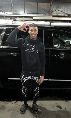 NLE Choppa wearing SoleBoy pants