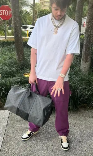 Murda Beatz wearing Acne Studios t-shirt