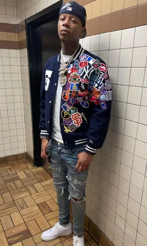 Big Scarr wearing Supreme jacket