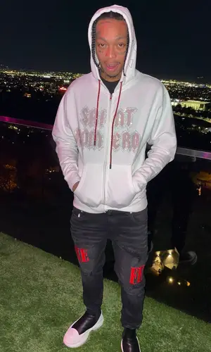 Tyla Yaweh wearing Alexander McQueen boots