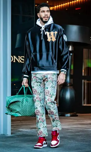 Jayson Tatum wearing Goyard bag