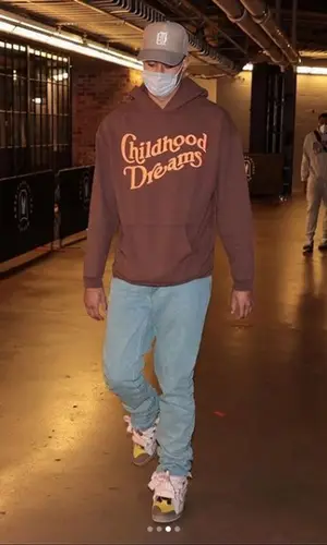 Kyle Kuzma wearing Childhood Dreams hoody