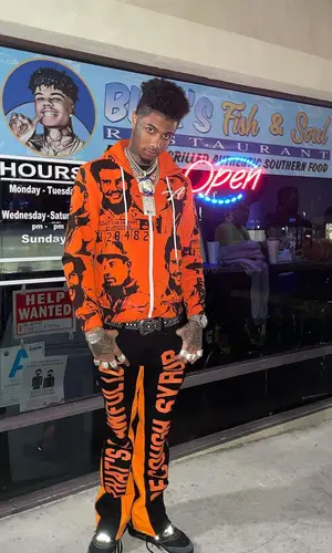 Blueface’s Outfit in Asaali Hoodie, Jordan Sneakers & B.B. Simon Belt (2022)