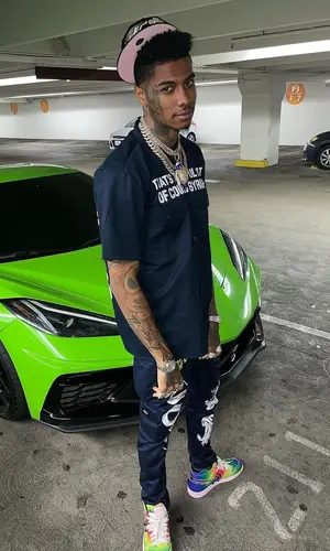 Blueface’s Outfit in Cough Syrup Shirt, J Balvin Merch Sneakers & Nike (2022)