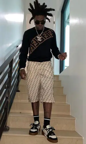 Kodak Black wearing Fendi swimwear