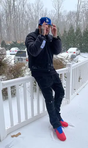 LiAngelo Ball’s Outfit in Alexander McQueen Jacket, Valabasas Jeans & New Era Cap (2022)
