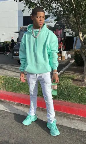 YK Osiris’ Outfit in Balenciaga Hoodie & Don't Let Mom Find Out Jeans (2022)