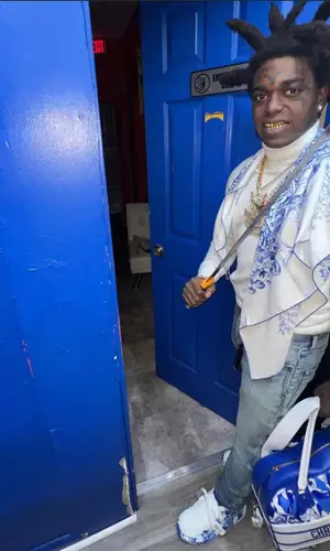 Kodak Black wearing Dior bag
