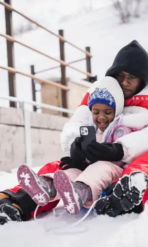 DaBaby wearing The North Face glov
