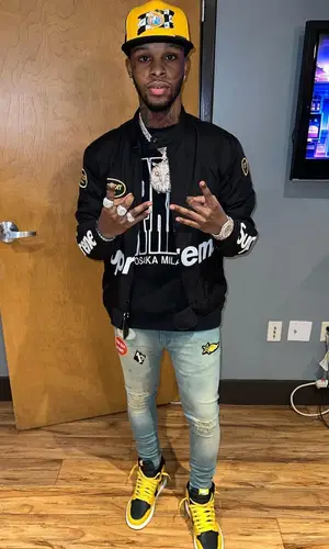 Toosii wearing Supreme jacket