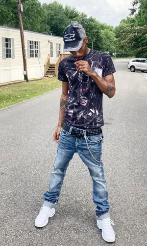 Black Kray wearing True Religion jeans