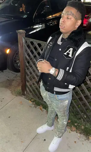Lil Gotit wearing Amiri belt