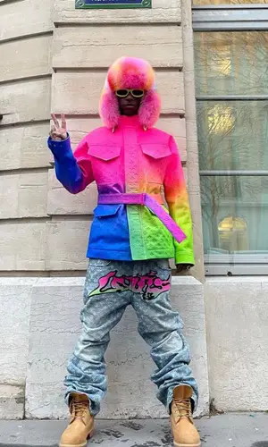 Bloody Osiris wearing Louis Vuitton jeans