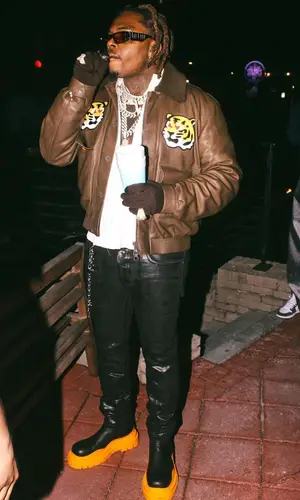 Gunna wearing Purple Brand jeans