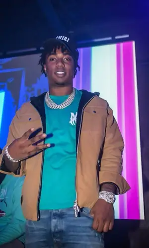 Fredo Bang wearing Amiri cap