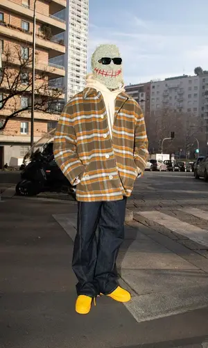 Offset wearing Greedy Unit hat