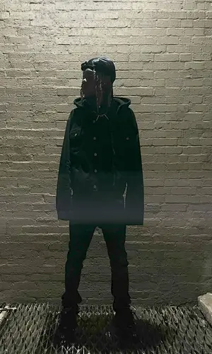 Destroy Lonely wearing Balenciaga sneakers