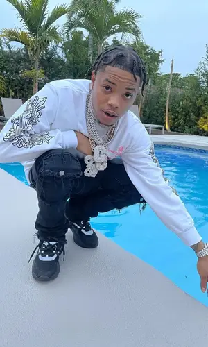 Lil Migo wearing Chrome Hearts sweatshirt
