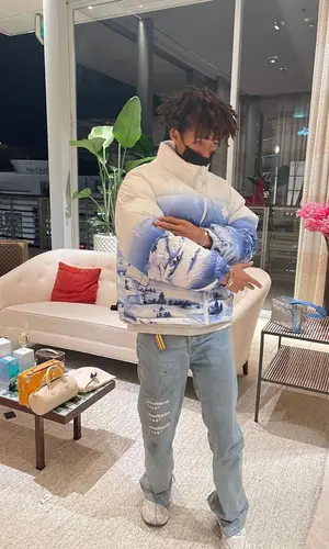 Jaden Smith’s Outfit in Louis Vuitton Jacket, MSFTSrep Jeans & New Balance Sneakers (2022)