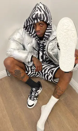 Famous Dex wearing Dolce & Gabbana shorts