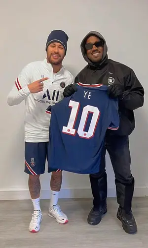 Kanye West wearing Jordan jersey