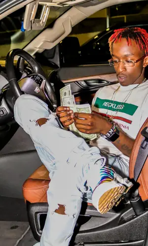 KayCyy wearing Nike sneakers