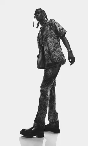 Lancey Foux wearing Louis Vuitton jeans
