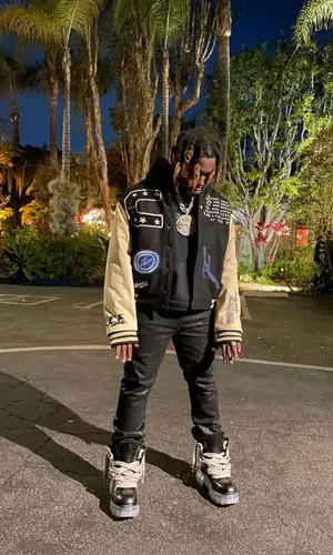Don Toliver’s Outfit in Travis Scott Merch Jacket, Rick Owens Boots & Fragment (2022)