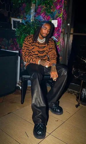 Quavo wearing Bottega Veneta boots