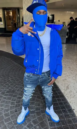DaBaby wearing Alexander McQueen jacket